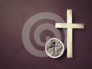 Lent Season,Holy Week and Good Friday Concepts - Image of ash inside bowl with vintage background. Stock photo.