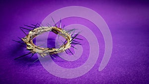 Lent Season, Holy Week and Good Friday concepts - image of crown of thorns in purple background