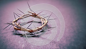 Lent Season,Holy Week and Good Friday concepts -image of crown of thorns in purple vintage background photo