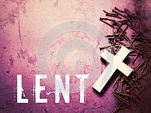 Lent Season,Holy Week and Good Friday Concepts - LENT text with cross shaped in purple vintage background. Stock photo.