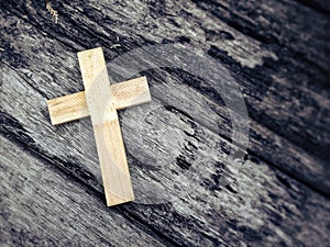 Lent Season,Holy Week and Good Friday concepts - wooden cross shaped image with vintage background. Stock photo.