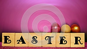 Lent Season,Holy Week and Good Friday concepts - word easter on wooden blocks with easter eggs background