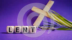 Lent Season,Holy Week and Good Friday concepts - word lent on wooden blocks in purple background
