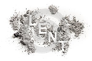 Lent word written in ash, sand, dust