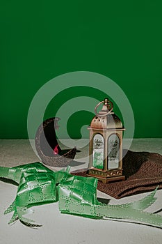 Lentera with green background suitable for greeting idul fitri