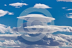 Lenticular clouds - Altocumulus lenticularis photo