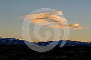 Lenticular clouds form over the Sierra Nevada