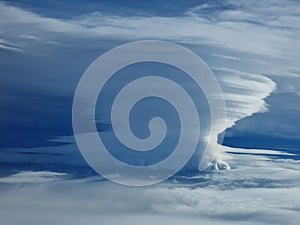 Lenticular clouds over mountain
