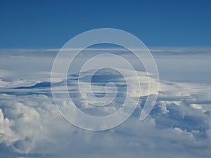 Lenticular clouds over mountain