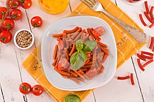 Lentil pasta with cherry tomatoes and basil.
