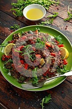 Lentil salad with roasted red pepper, zucchini and dry tomatoes, lemon. healthy food, vegetarian and vegan style