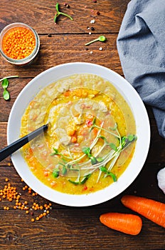 Lentil Soup, Homemade Vegetable Soup with Chicken and Herbs on Wooden Background, Healthy Eating