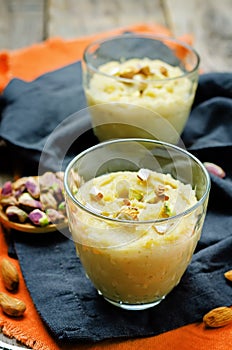 Lentils halwa. Indian sweets in a glass on a wood background