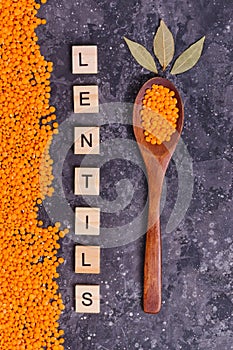 Lentils for proper nutrition and the health of vegetarians in a wooden spoon