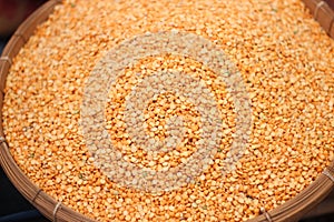 Lentils are yellow colors in the traditional bamboo cage