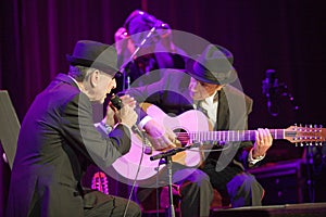 Leonard Cohen performs on stage at Sportarena