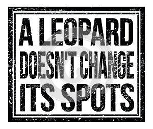 A LEOPARD DOESN`T CHANGE ITS SPOTS, text on black grungy stamp sign