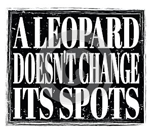 A LEOPARD DOESN`T CHANGE ITS SPOTS, text on black stamp sign