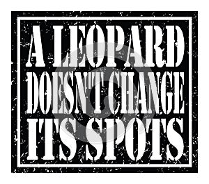 A LEOPARD DOESN`T CHANGE ITS SPOTS, text written on black stamp sign