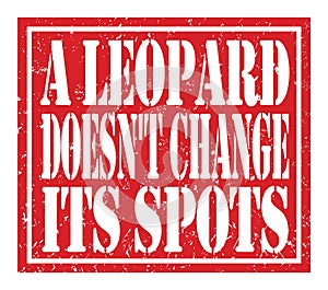 A LEOPARD DOESN`T CHANGE ITS SPOTS, text written on red stamp sign