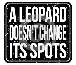 A LEOPARD DOESN`T CHANGE ITS SPOTS, words on black stamp sign