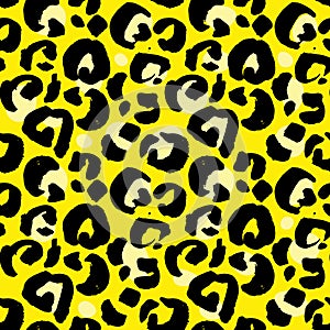 Leopard print seamless pattern. Yellow hand drawn background. Vector illustration.