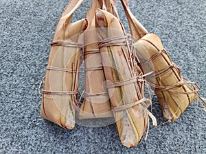 Lepet / Leupeut is a kind of snack made from sticky rice mixed with beans