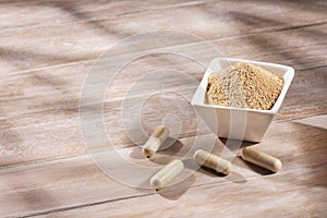 Lepidium meyenii - Organic Maca in a heart-shaped bowl, tablets