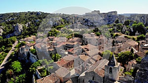 Les Baux de Provence village on the rock formation and its castle France Europe. Drone view