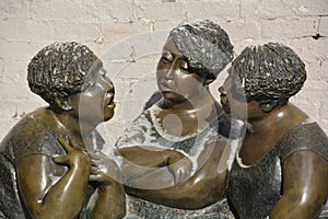 Les Chuchoteuses is a bronze sculpture