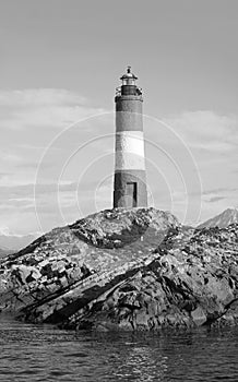 Les Eclaireurs lighthouse on a rocky islands, symbol of Beagle channel, Ushuaia, Tierra del Fuego, Argentina in