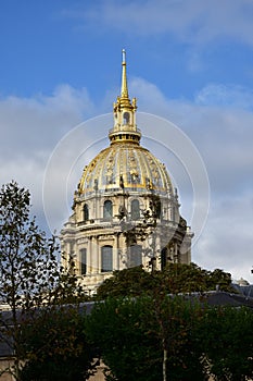 Les Invalides golden dome from nearby street. Paris, France.