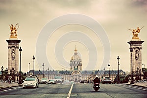 Les Invalides seen from Pont Alexandre III bridge in Paris, France. Vintage