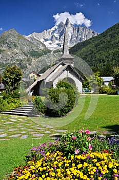 Les Praz de Chamonix and Aiguille Dru mountain