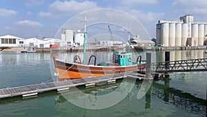 Les Sables D Olonne western France. The boat is moored to the pier.