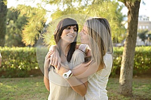 Lesbian couple hugging photo