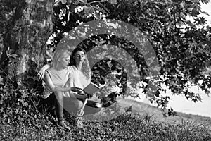 Lesbian relations. Two young girls read book