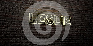 LESLIE -Realistic Neon Sign on Brick Wall background - 3D rendered royalty free stock image