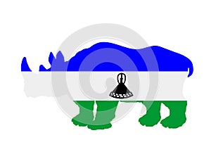 Lesotho flag over rhino national animal vector silhouette illustration isolated on white background.