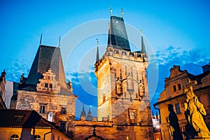 Lesser Town Tower Bridge by Charles Bridge at dusk, Prague, Czechia