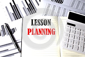 LESSON PLANNING text written on a notebook on chart and diagram