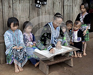 Lessons with children ethnic group Meo, Asia photo