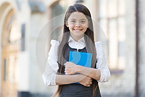 Let the book talk. Happy child hold library book. School library. Library reader outdoors. Cute bookworm back to school