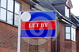 Let by estate agency sign at homes for rent