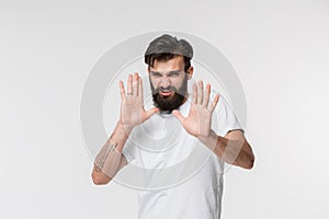 Let me think. Doubtful pensive man with thoughtful expression making choice