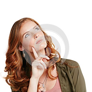 Let me think about it first...Studio shot of a young woman looking thoughtful against a white background.