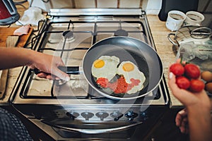 Let`s cooking love. Romantic breakfast. Young couple at the kitc
