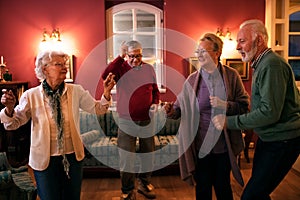 Let`s dance, group of senior people dancing and having fun