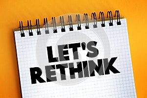 Let`s Rethink text on notepad, concept background