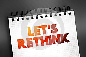 Let\'s Rethink text on notepad, concept background